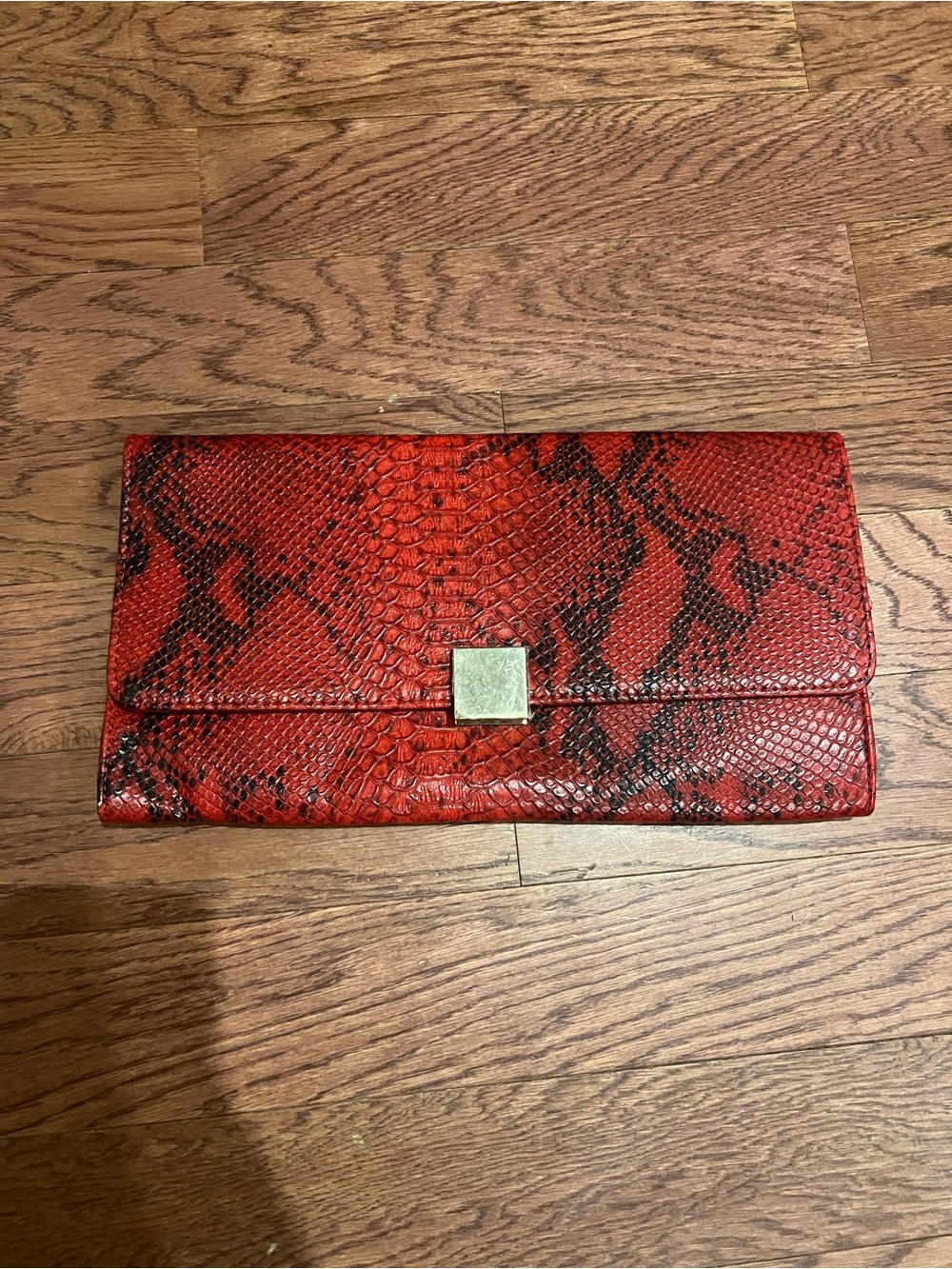 Red Snake-Print Foldover Clutch with Gold Accent